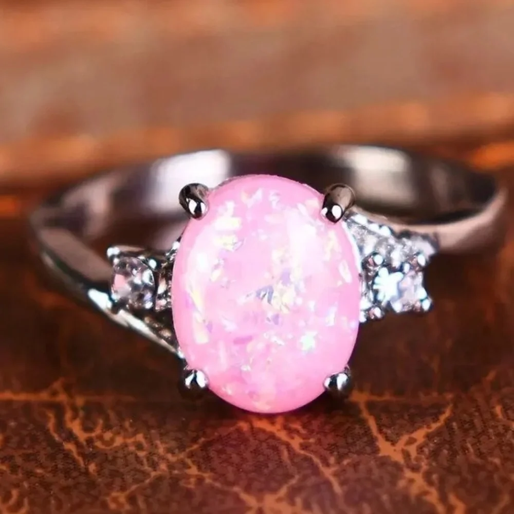 BRAND NEW.925SS OVAL CUT PINK OPAL RING